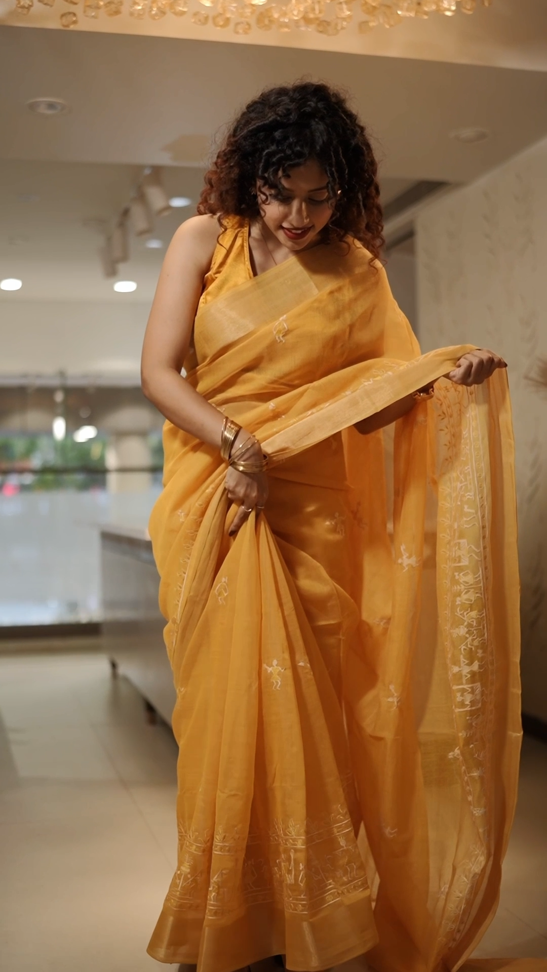 Yellow Varli Art Saree with unstitched blouse piece – festive and wedding wear | Navrang Drapes
